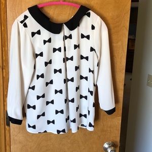 3/$30 Bow tie, cream and black blouse.